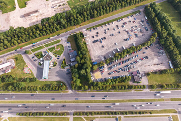 aerial view on large open air parking lot for cars for residents of area