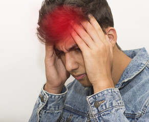 Fototapeta premium Young man suffering from headache