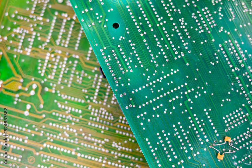 Fototapete old computer chips that are out of order. not working microshops with transistors, chips and conduct
