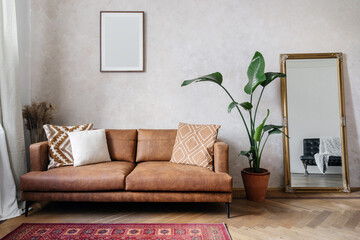 Living room interior with brown sofa and home decor