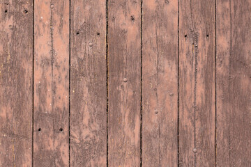 Obraz premium Wood background texture. Wooden surface, old boards, red-brown paint, blank retro template for advertising lettering, rough material, grungy textured background closeup.