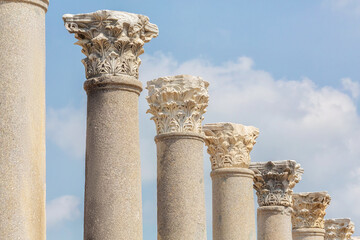 Corinthian Columns. Row of columns in Perge, Antalya, Turkey. Remains of colonnaded street in Pamphylian ancient city. Selected focus, copy space