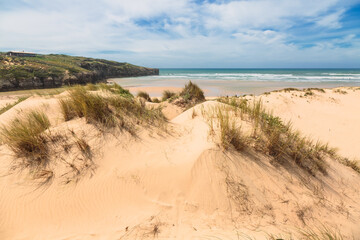 Dunes and sea landscape at the Amoreira beach in Portugal
