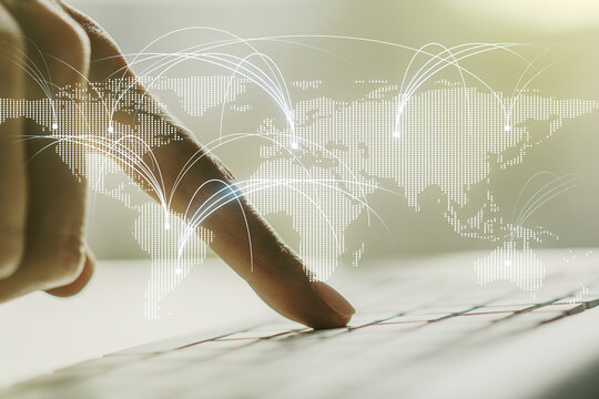 Double exposure of abstract digital world map with connections and hands typing on laptop on background, research and strategy concept