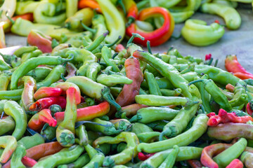 Green and red peppers in the market