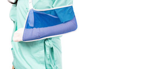 Injured person put on soft splint due to broken arm isolated on white background copy space Patient...