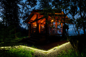 Night lights at the glamping in the forest