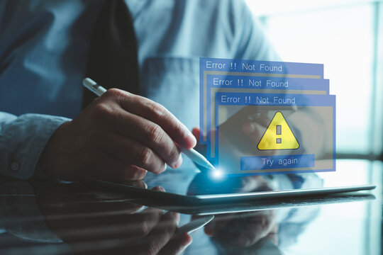 Server Not Found Error Danger Caution Warning Concept. 404 Error Page Not Found. Businessman using computer laptop with triangle caution warning sing for notification error and maintenance concept.