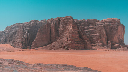 Tourist observes the panorama in the desert Wadi Rum, Jordan