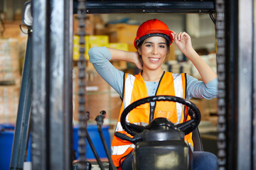 female worker prepare to driving forklift in warehouse storage © offsuperphoto