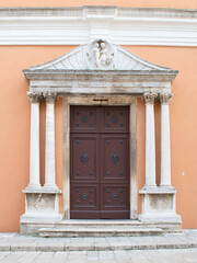 Fototapeta premium Ornamented door of the old church of St Simeon in Zadar, Croatia, famous travel destination