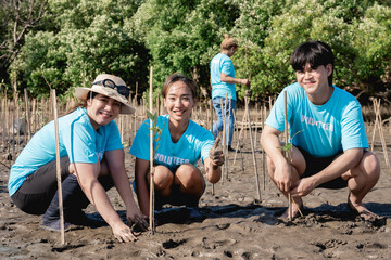Volunteers help plant a forest to save the world in the forest park area., Environmental protection...