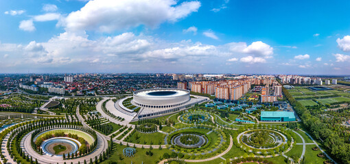 city park in the north-east of Krasnodar (South of Russia) with many round and oval flower beds,...