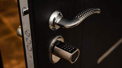 Open door to the apartment with a combination lock. Keyless entry.