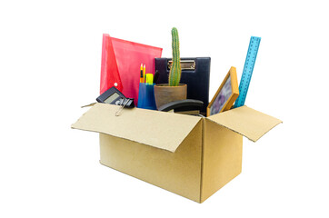 Cardboard box full of office stuff on white background