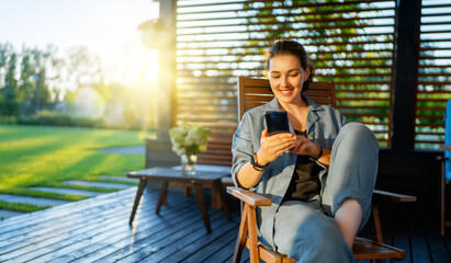 Fototapeta premium woman is using a phone