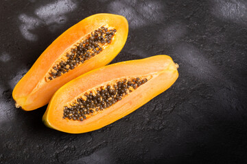 Papaya fruit on the table, top view