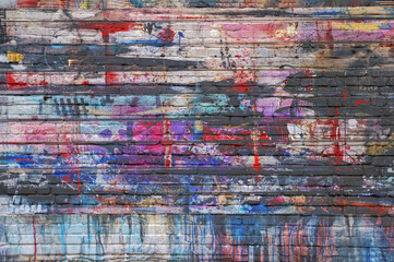 Colored grunge brick wall room background.