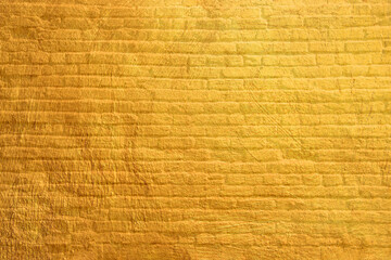 Yellow brick wall background or texture