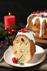 Piece of traditional homemade Christmas cake on table, closeup