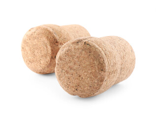 Two sparkling wine corks on white background
