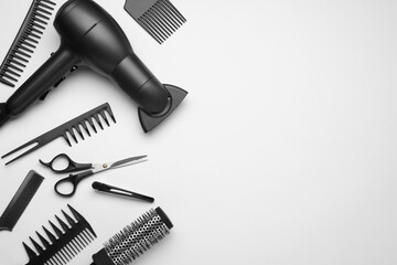 Flat lay composition with modern hair dryer on white background, space for text - Powered by Adobe