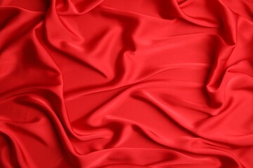 Texture of delicate red silk as background, top view