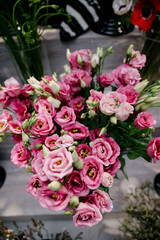 Pink roses in a flower shop.Flowers in a flower shop. Concept flower store and delivery.