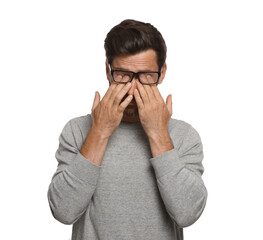 Man suffering from eyestrain on white background