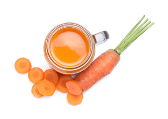 Freshly made carrot juice in mason jar on white background, top view