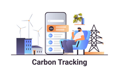 businessman using mobile app carbon tracking concept responsibility of co2 emission environment strategy