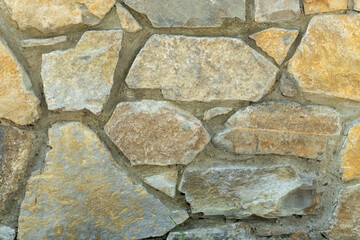 The texture of the stone wall. Stone wall as background or texture.