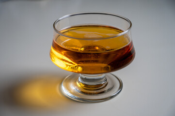 Glass of apple cider drink on white table, Normandy, France