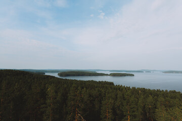 clouds over the lake in padasjoki, finland