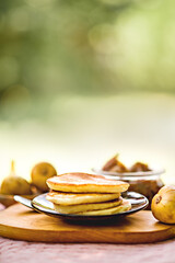Homemade american pancakes with figs and honey. Healthy morning breakfast.