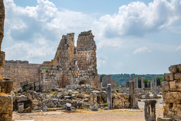 Naklejka premium Perge, Hellenistic gates ruins. Greco-Roman ancient city Perga view. Greek colony from 7th century BC, conquered by Persians and Alexander the Great in 334 BC.