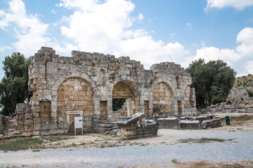 Fototapeta na wymiar The Later City Gate from the 4th century of Perge. Greco-Roman ancient city Perga. Greek colony from 7th century BC, conquered by Persians and Alexander the Great in 334 BC.