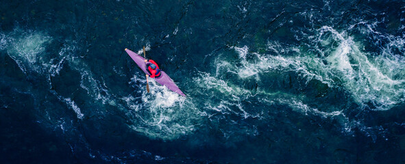 Fototapeta Extreme kayak boat rough river aerial top view, sunny day. Concept travel rafting adrenaline obraz