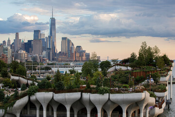 Elevated dusk view of Little Island Park with lower Manhattan in the background