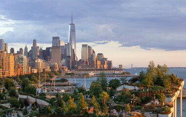 Elevated dusk view of Little Island Park with lower Manhattan in the background