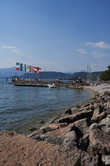 Bardolino, Italy - July 11, 2022 - Cisano - the small boat harbor on a summer afternoon       