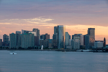 Panoramic dusk view of Jersey City, NJ across the Hudson 