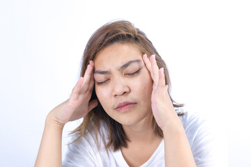 Asian woman suffers from headaches, migraines and stress, health problems