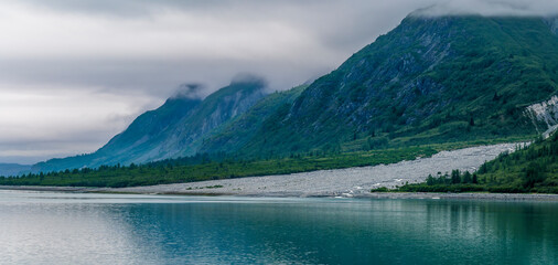 A view of moraine deposits close to the Margerie Glacier in Glacier Bay, Alaska in summertime © Nicola