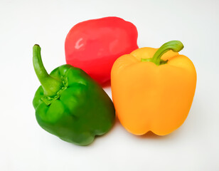yellow, red, green bell peppers. Bell pepper or Paprika (Psicum annuum) also called sweet pepper or capsicum