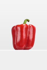 fresh red bell pepper, mexican ingredient on minimalistic white background