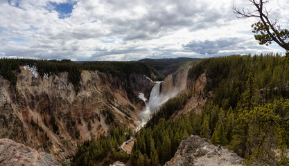 Rocky Canyon, River and Waterfall in American Landscape. Grand Canyon of The Yellowstone. Yellowstone National Park. United States. Nature Background.