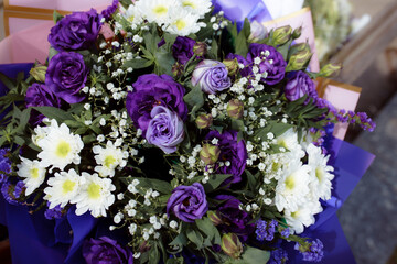 A bouquet of flowers for the newlyweds. Preparation for the wedding ceremony. Flowers and podiums to decorate the location. Bouquet for congratulations on your birthday.