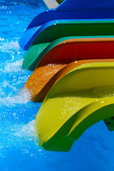 Colorful slides in the water park in summer