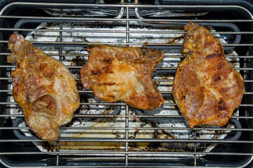 Baking grilled pork meat in the garden